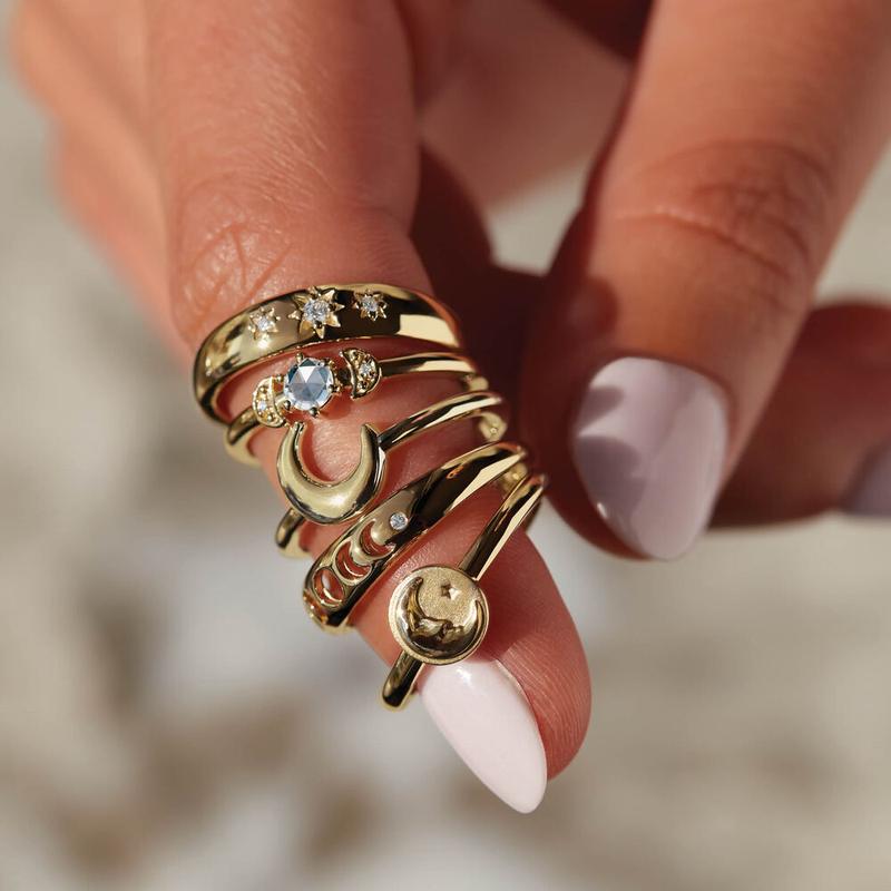 Custom celestial diamond stacking rings in 14k gold