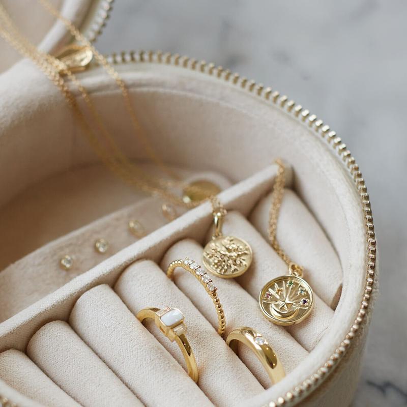 Gold keepsake jewelry in a jewelry box