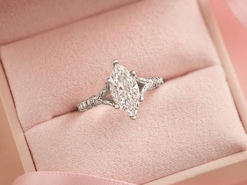 Marquise diamond ring in an antique scrolled setting