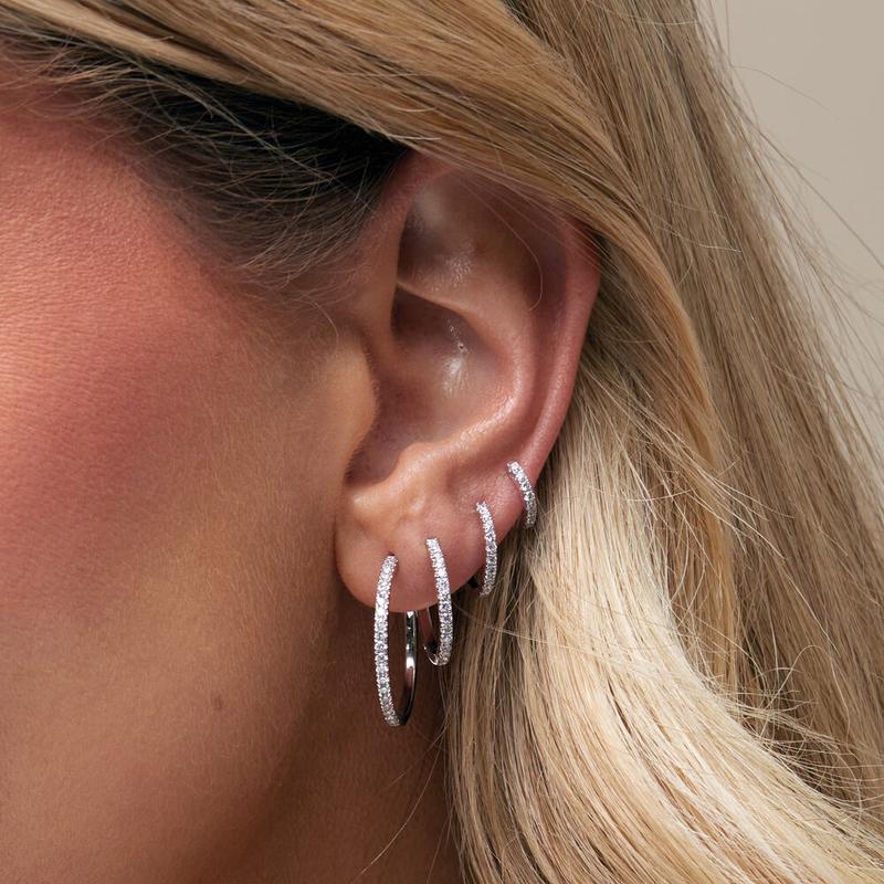 Pavé diamond hoop earrings in white gold