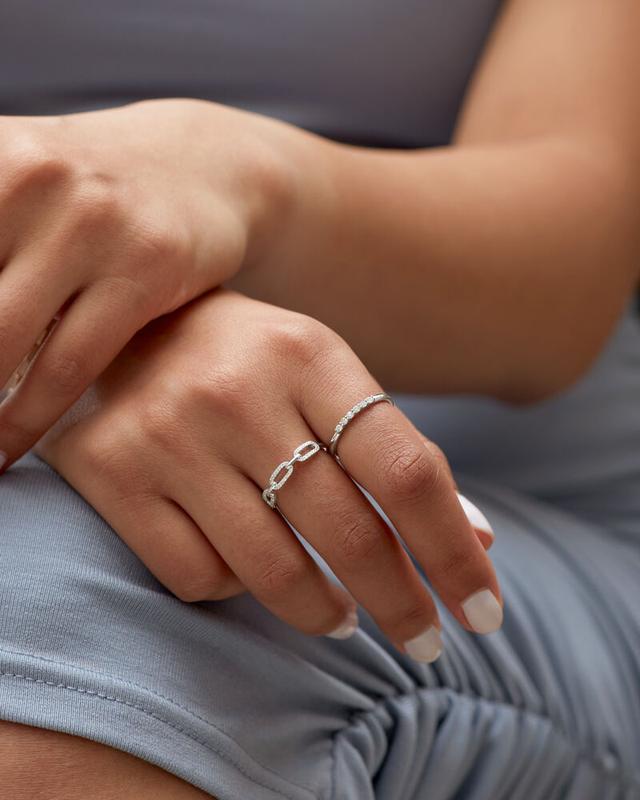 Dainty gold chain rings and pavé diamond bands