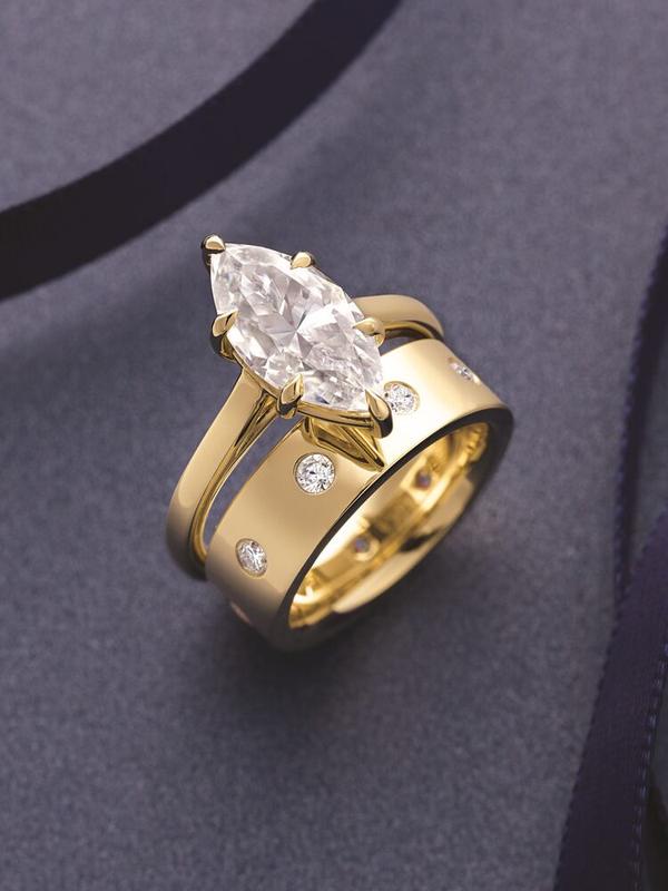 Marquise diamond split-shank engagement ring