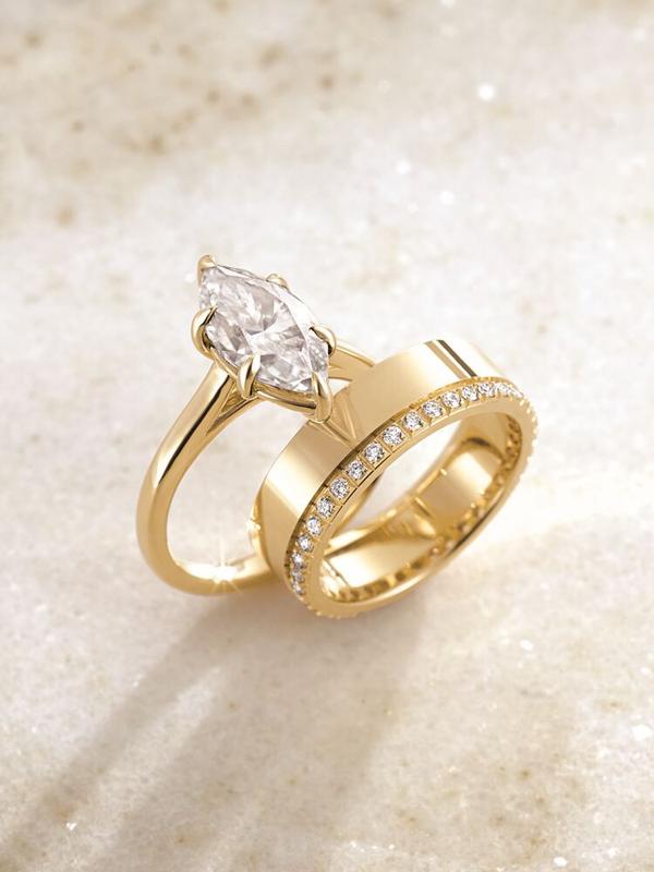 Marquise diamond solitaire with pavé eternity band