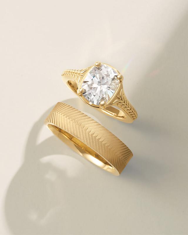 Cushion-cut signet-style ring with herringbone band