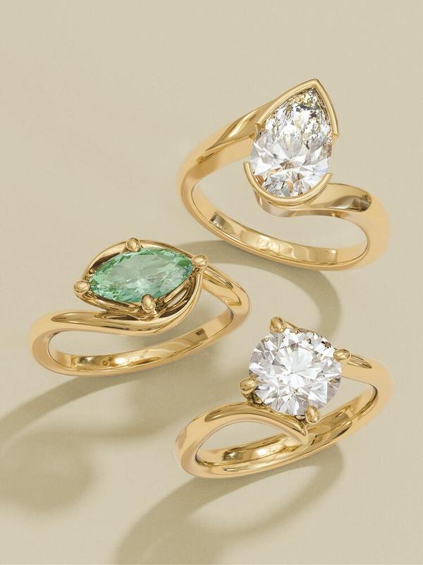 Sculptural bezel-set rings with mint gemstone