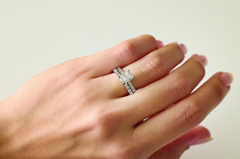 Custom diamond wedding set worn on the hand