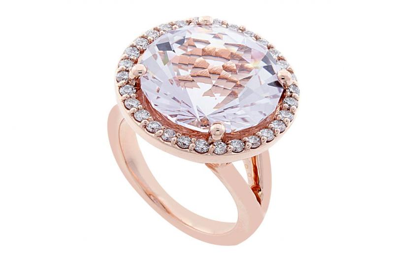 Blush-pink gemstone halo ring in rose gold