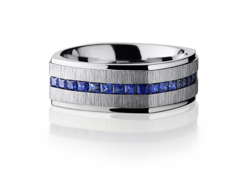 Men's channel-set sapphire wedding band with brushed finish