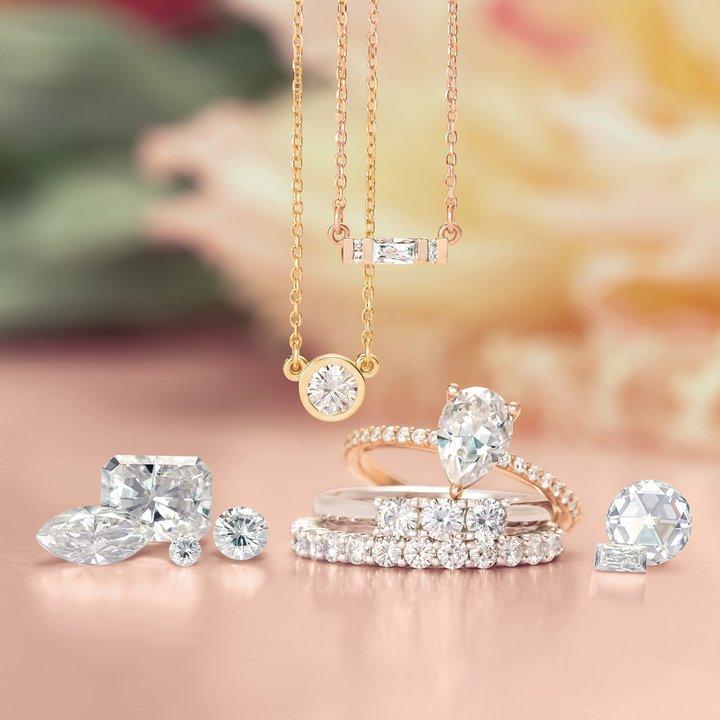 Loose diamonds with finished custom jewelry — the design process