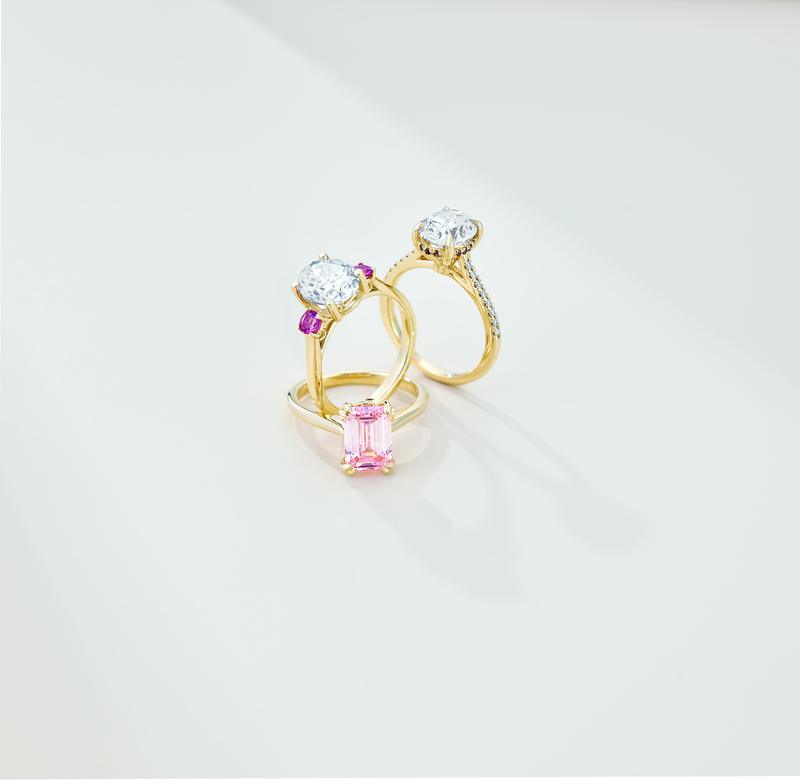 Diamond solitaire engagement rings with pink emerald-cut ring