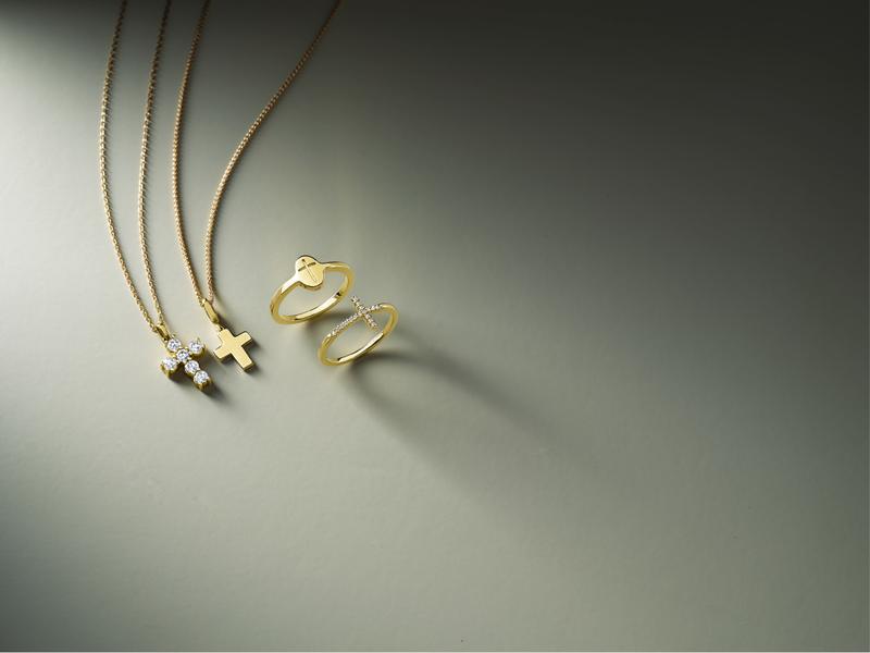 Gold cross pendant necklaces and heart ring