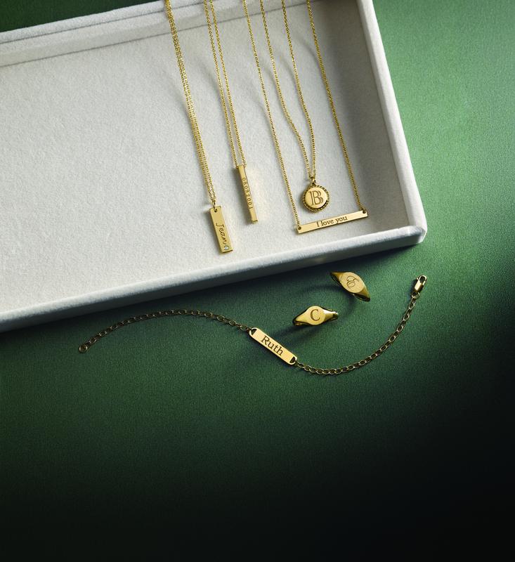 Gold bar pendant necklaces and engraved plaque bracelet