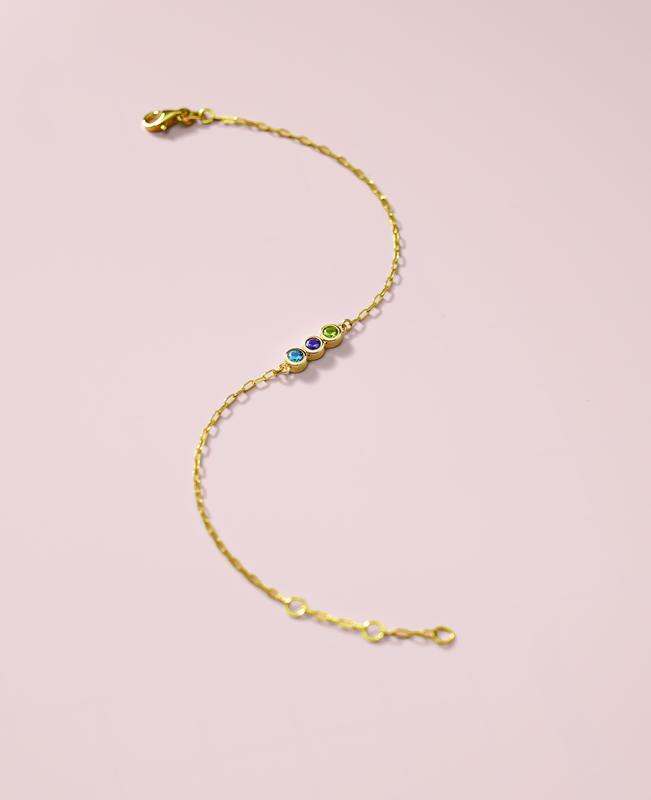 Gemstone station bracelet in yellow gold
