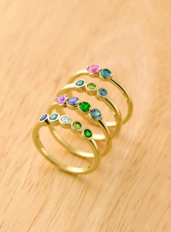 Birthstone bezel stacking rings in yellow gold