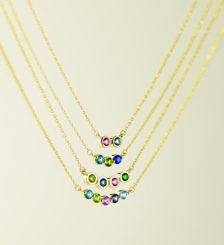 Birthstone station necklaces in yellow gold