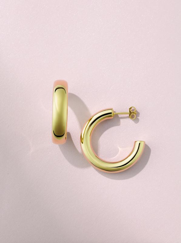 Gold tube hoop earrings