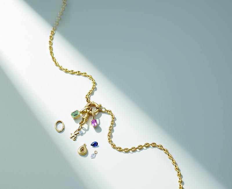 Gold charm cluster necklace