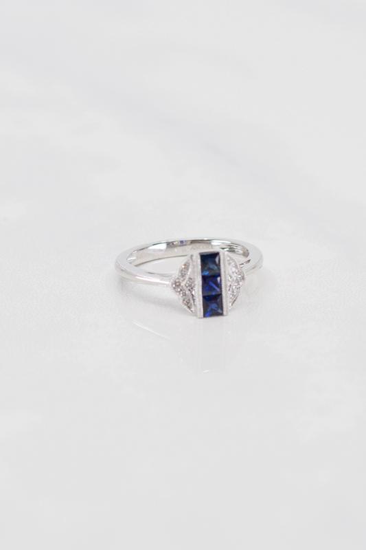 Custom sapphire and diamond ring in white gold