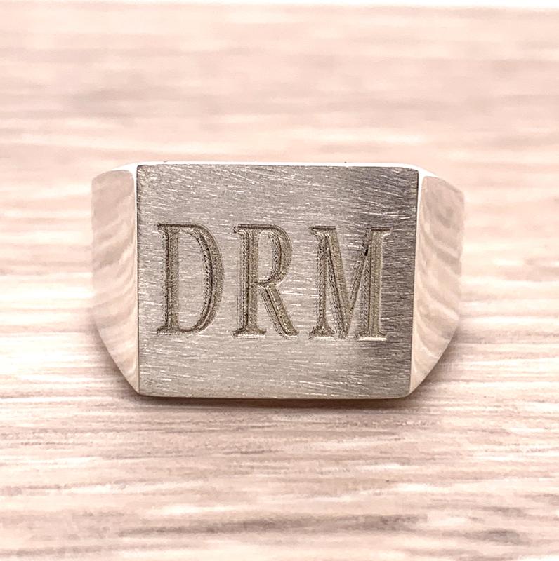 Custom engraved monogram signet ring in white gold